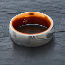 Load image into Gallery viewer, Wood Grain Damascus Steel Ring - Resilient Orange - EMBR
